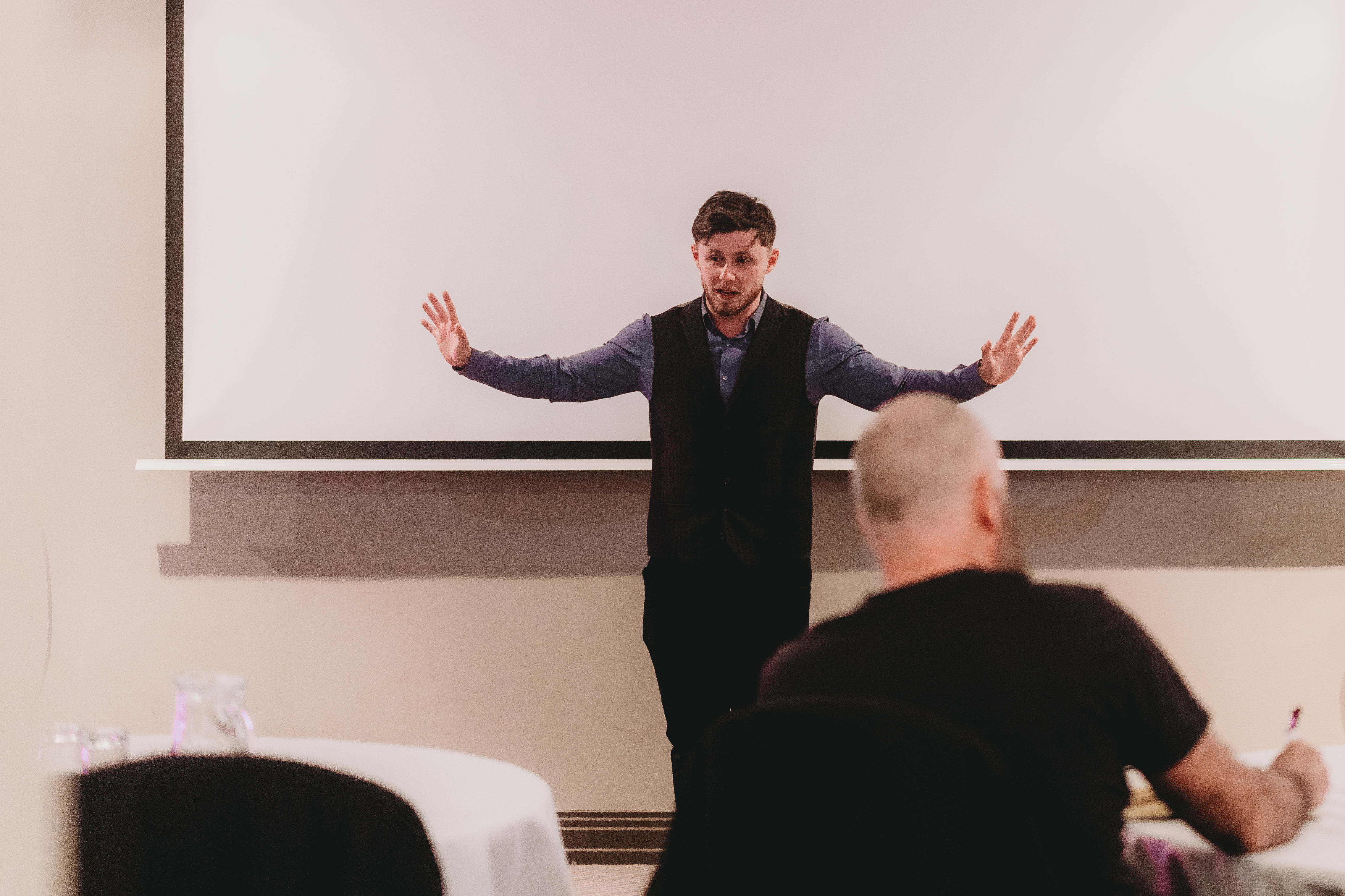 Lewis Hunter speaking at a business networking event